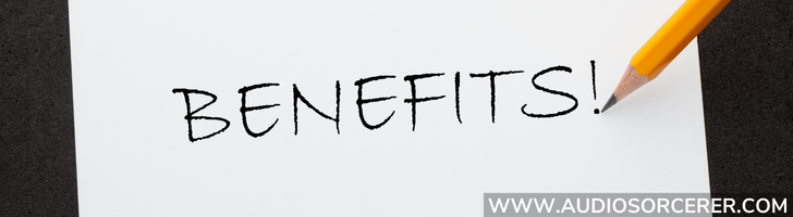The word benefits written on a piece of paper with a pencil representing the pros of parallel compression.