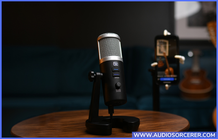 PreSonus Revelator USB-C Condenser Microphone with StudioLive Voice Effects Processing sitting on a wooden table.
