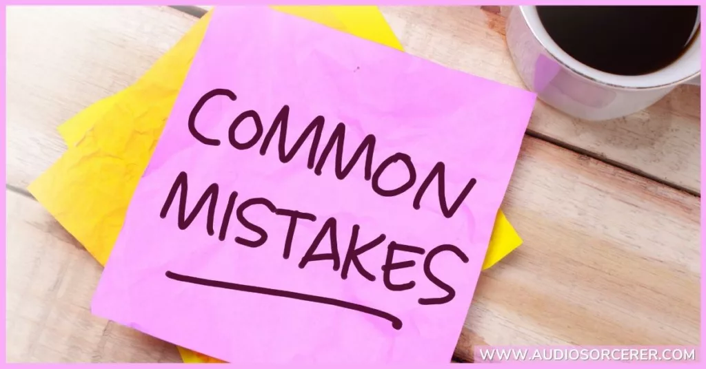 A pink sticky pad sitting on a yellow stick pad that says the words, "common mistakes".
