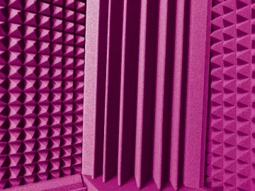 Pink acoustic foam featuring a bass trap.