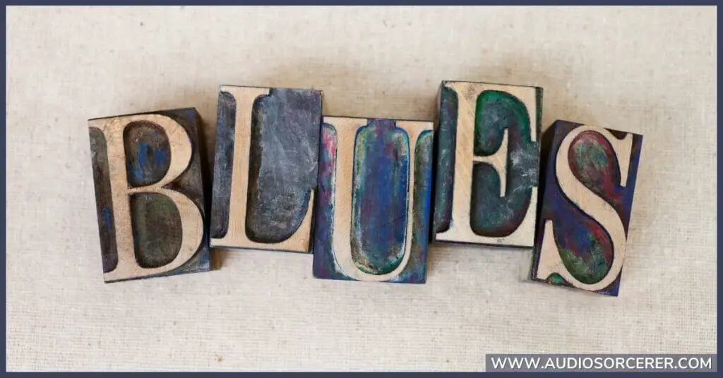 An artistic print of the word "Blues" representing the Mixolydian mode in music.