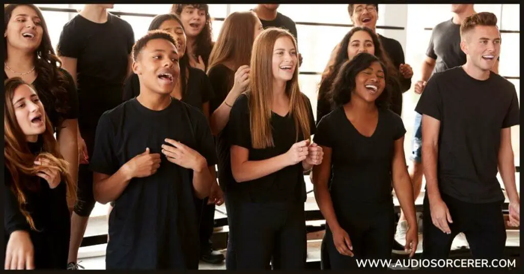 A teenage choir practicing together.