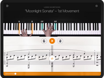 A piano player playing the "Moonlight Sonata - 1st Movement" in the Flowkey online piano lessons program.